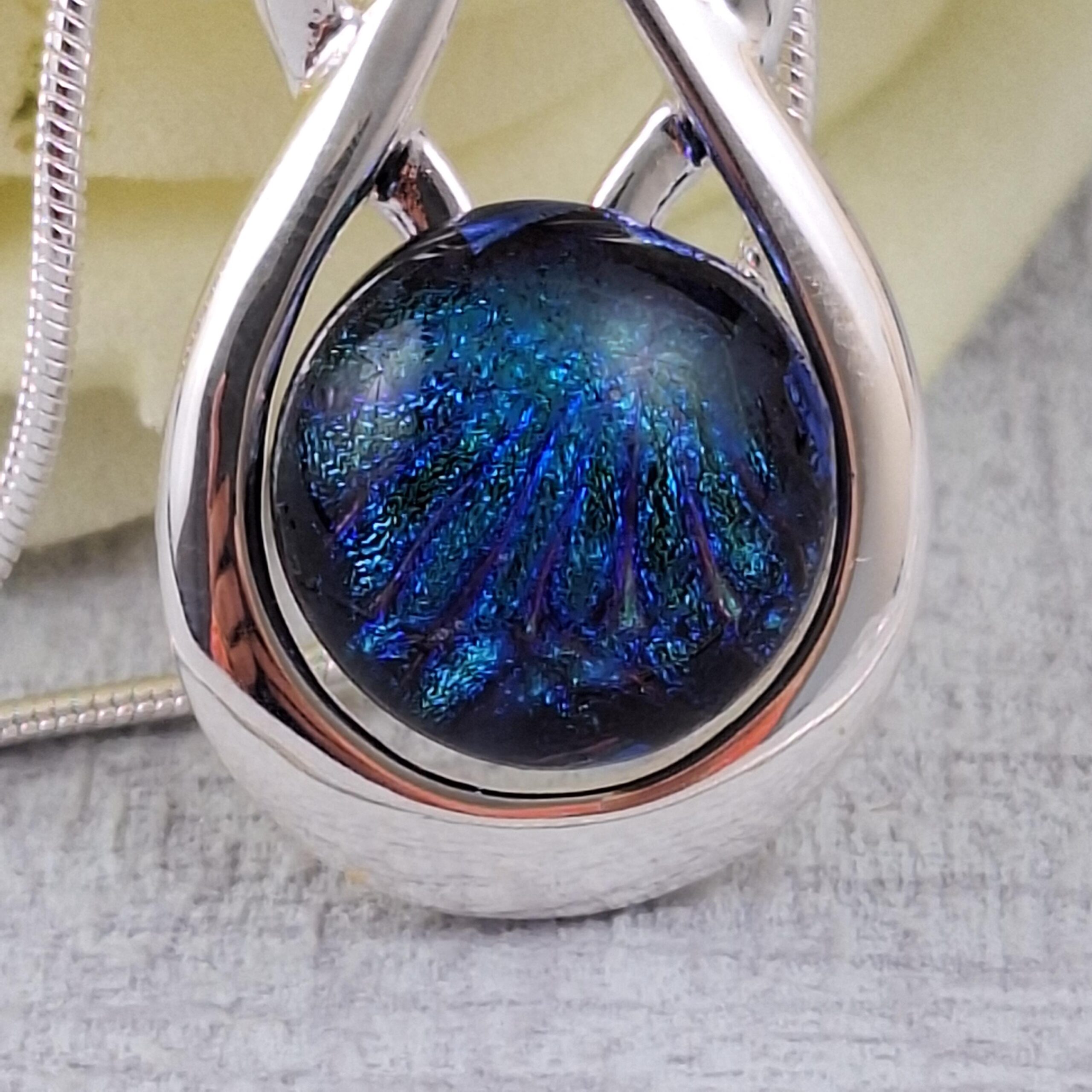 blue celtic knock dichroic glass pendant with chain